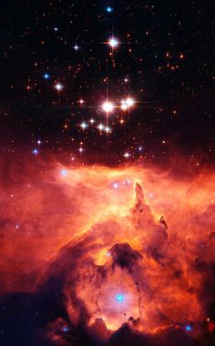 an image of the star cluster in the sky with stars all over it and some bright lights