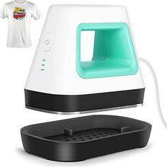 a white and black ironing machine with green light on the front, next to it's charging station