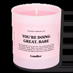 a pink candle that reads i'm dreaming of a pink christmas