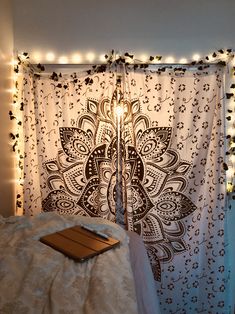 a room with lights and curtains on the wall