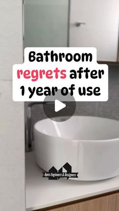 bathroom regrets after 1 year of use sign in front of sink with mirror