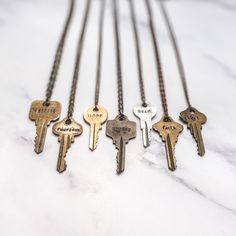 🌿Choose your own word, font + chain. 🌿Each key necklace comes in its own cute cotton bag. TO ORDER: 1. Choose your word + type it in the personalization box. 2. Choose your font from the drop down menu. 3. Choose your chain + length from the drop down menu. KEY SELECTION: I will select your key to accommodate your word and font selections. No two keys are the same therefore, the size and color of the key will vary. HAND STAMPING Each character is stamped by hand with a metal stamp and hammer. Vintage Metal Jewelry With Keys, Vintage Pendant Jewelry With Keys, Vintage Brass Necklaces With Two Keys, Key Necklace Vintage, Skeleton Key Necklace Vintage, Retro Kids, Key Jewelry, Star Chain, Vintage Keys