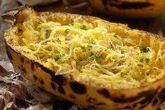 a bowl filled with food sitting on top of a table