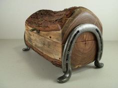 a piece of wood with metal handles on it