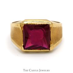 Men's Synthetic Ruby Intaglio Ring with Brush Textured Sides in 18k Yellow Gold ABOUT THIS ITEMElevate your style with the regal allure of our Men's Synthetic Ruby Intaglio Ring. The centerpiece of this opulent creation is a striking synthetic ruby, deeply carved with an intaglio design that denotes distinction and sophistication. This artful carving captures the essence of classical refinement and personal eminence, making it the perfect emblem for the modern gentleman. Framing this majestic stone is a band of sumptuous 18k yellow gold, its exquisite hue reminiscent of ancient treasures. The band is thoughtfully adorned with brush textured sides, an intricate design that adds a tactile dimension to the ring's appearance, enticing the eye and the touch. This bespoke blend of texture and lu Intaglio Ring, Ring Pictures, Modern Gentleman, Men's Jewelry Rings, Intricate Design, Gentleman, Bespoke, Mens Jewelry, Jewelry Watches