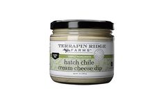 an open jar of cream cheese dip on a white background with the words terrapin ridge farms