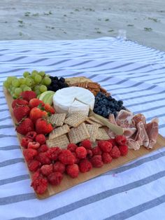 picnic
beach
charcuterie board
fruits 
cheese board Charcuterie Board Beach, Beach Platter, Beach Charcuterie Board, Charcuterie Board Picnic, Beach Bday