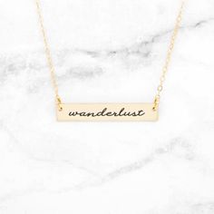 Wanderlust - Gold Quote Bar Necklace If you're a wayfaring princess, a fan of the great outdoors, a road trip junkie, or a frequent flyer, then this beautiful gold Wanderlust necklace is for you! This dainty bar necklace is the perfect accessory to wear on its own or to layer with other lovely chains. This makes the perfect gift for a birthday, anniversary, Valentine's Day, Christmas, a Graduation, or just because! This pretty Wanderlust necklace is perfect for the wanderer or adventure seeker! Gold Bar Necklace Engraved, Rose Gold Quotes, Silver Quotes, Dainty Bar Necklace, Gold Bar Necklace Personalized, Horizontal Bar Necklace, Rose Gold Bar, Engraved Bar Necklace, German Quotes