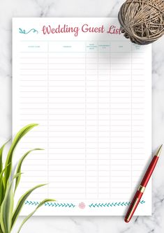 a wedding guest list on top of a table next to a ball of yarn