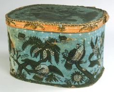 an ornately decorated box with birds and flowers on it