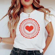 Introducing our Heart Stamp Shirt! This charming tee features a simple yet eye-catching Red heart stamp design, perfect for adding a touch of love to your everyday look. Available Colors: White, Black, Dark Grey Heather, Navy, Black Heather ✨View More Designs Like This In My Shop! https://spiritguided44.etsy.com ❥ Welcome to our Spirit Guided Shop!  Everything in our shop is hand crafted and made to order.  If you are looking for a different color or size please contact me! -------Product ------ Stamp Shirt, Sending Love, Heart Tee, Heart Stamp, Valentines Day Shirts, Love Shirt, Prism Color, Stamp Design, Cute Woman