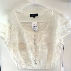 Nwt Majorelle White Short Sleeve Embroidered Crop Buttons Size S Smocking At The Waist 100% Viscose $130 Retail Sold At Revolve B-100 Corset And Skirt, Crochet Bell Sleeve, Polka Dot Crop Top, Bell Sleeve Crop Top, Embroidered Crop Tops, Corset Style Tops, Off Shoulder Crop Top, Small Crop Tops, Halter Crop Top