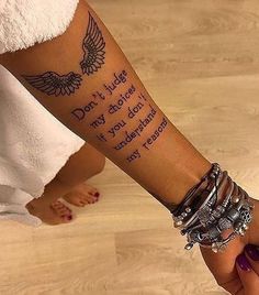 a woman's arm with a tattoo that says don't judge my body