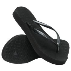 Elevate your look without sacrificing comfort in the Slim Flatform flip flop. Featuring the best-selling Slim shape with a subtle and stylish boost of height. Havaianas Women's Slim Flatform Flip Flops Sandal | Black | Size 9/10W Rubber Flip Flops, Havaianas Flip Flops, Black Flip Flops, Elevate Your Look, Beach Sandals, Black Design, Flip Flop, Flip Flop Sandals, Platform Sandals