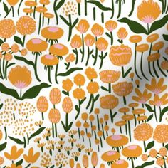 an orange and white flower pattern on fabric