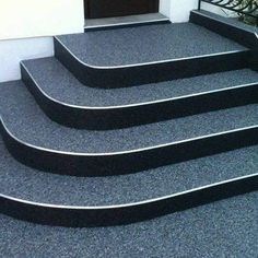 a set of stairs leading up to a door