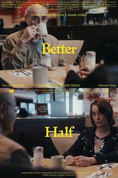 two people sitting at a table in front of each other with the words better half on them