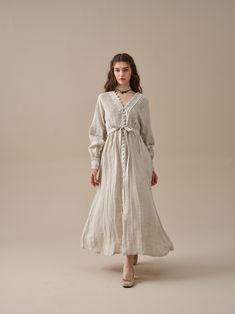 Cream Buttoned Dress For Daywear, Cream Button Dress For Daywear, Bohemian Tunic Dress With Buttons, Long Linen Dress For Daywear, Chic Daywear Linen Dress With Buttons, Chic Linen Dress With Buttons For Daywear, Chic Linen Day Dress With Buttons, Elegant Cream Linen Midi Dress, Elegant Neutral Linen Midi Dress