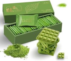 green tea powder and matchsticks in a box with the package next to it