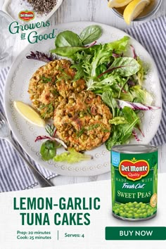 the advertisement for lemon garlic tuna cakes is displayed on a white plate with green beans and lettuce