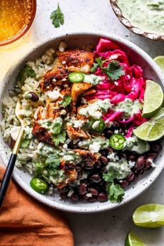 fish taco bowls with cilantro lime rice and creamy veggie sauce