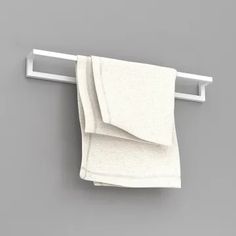 a white towel hanging on a metal bar