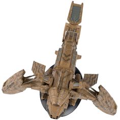 a cardboard model of a fighter jet flying through the air