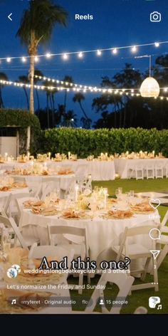 an image of a table set up with white linens and lights in the background