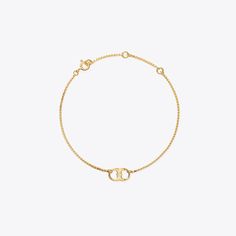 Empowering women. Made of fine silver or gold vermeil chain and detailed with a Gemini Link charm, our bracelet symbolizes a shared bond and the impact of collaboration. 100% of net proceeds benefit the Tory Burch Foundation, which supports women entrepreneurs with access to capital, education, digital resources and a networking community. Whether you wear one or share one, join us in our mission to empower women and women entrepreneurs. Adjustable Sterling Silver Chain Bracelet In Yellow Gold, Gold Sterling Silver Cable Chain Bracelet, Gold Sterling Silver Bracelet With Cable Chain, Luxury Delicate Chain Gold Bracelet, Designer Bracelets, Tory Burch Jewelry, Women Entrepreneurs, The Embrace, Empower Women