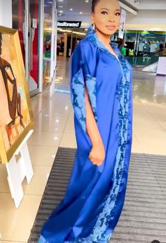 Introducing our stunning handmade maxi Ankara fabric dress with exaggerated sleeves, tailored to perfection just for you! ❣️Crafted from high-quality 100% Ankara fabric, this dress is a true masterpiece. Each piece is carefully handcrafted with meticulous attention to detail, ensuring that every stitch is perfect. ❣️We understand that every woman is unique, and that's why we offer this dress made to order, tailored specifically to your measurements. Whether you prefer your custom measurements or Elegant Maxi Length Abaya For Vacation, Elegant Blue Maxi Dress For Eid, Blue Long Sleeve Thobe For Party, Elegant Blue Maxi Abaya, Elegant Blue Maxi Length Abaya, Blue Long Dress For Eid, Silk Maxi Length Abaya, Blue Party Dress With Kimono Sleeves, Elegant Blue Floor-length Kaftan