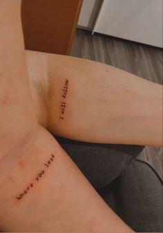 two people with matching tattoos that say i love you