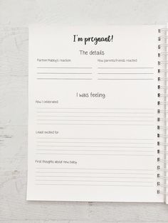 a notepad with the words i'm pregnant on it