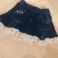 Super Cute Girls Denim Skirt. It Have White Patterned Ruffle On The Bottom. This Skirt Has 4 Pockets. Stretchy Waistband To Fit Any Size. Never Worn And New Condition. Thrift Outfit, Thrift Outfits, Shifting Closet, Girls Denim Skirts, Y2k Thrift, Skirt Diy, Rose Skirt, Clothes Board, Diy Skirt