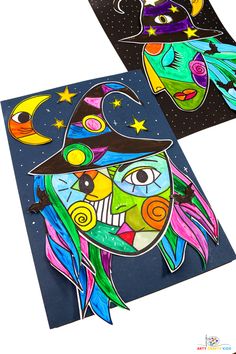 two colorful paper cut outs with faces on them, one is wearing a witches hat and the other has a witch's face