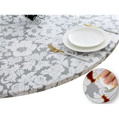 there is a place setting on the table with plates and silverware in front of it