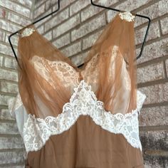 To Absolutely Die For. This Is Part Of A Huge Vintage Lingerie Collection. I’m Listing These For A Collector. It Has Been Folded In Storage For Many Years. No Smoke Or Pets 1960s Vanity Fair Under Arms :36 W 28 Hips Free Front Shoulder To Hem 42.7 Diameter Of Hemline :88 The Only Issue Is A Place On The About 1-1 5 “ On The Waist . It Has Come Unsewn. No Other Issues. Sheer Cream Nightgown For Wedding Night, Cream Sleeveless Sheer Sleepwear, Vintage Sheer Lace Nightgown, Vintage Sheer Nightgown For Wedding Night, Vintage Cream Sleeveless Sleepwear, Vintage Beige Dress For Wedding Night, Vintage Sheer Lace Sleepwear, Vintage Sheer Sleeveless Sleepwear, Vintage Sheer Sleepwear For Evening