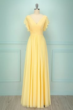 Do you want to look jawdropping, but still classy, elegant and demure? This lovely subtle yellow dress is for you. Featuring short ruffly sleeves and a V neckline that gives way to a wrinkled bodice adjusted at the waist, to enhance your beautiful curvy figure, keeping a willowy, dreamlike appeareance. The beautiful, lovely, flowy long skirt will cover your feet and swish around you with every dainty little step you take. Take this dress to prom if you want to look like a charming little flower! Fitted Bridesmaid Dresses, Yellow Bridesmaid Dress, Short Sleeve Prom Dresses, Yellow Bridesmaid, Backless Bridesmaid Dress, Long Flowy Skirt, Yellow Bridesmaid Dresses, Yellow Bridesmaids, Yellow Silk