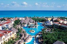 an aerial view of the resort and pool area at dreamscape cancuce beach