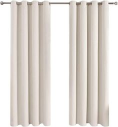 two white curtains hanging on a metal rod