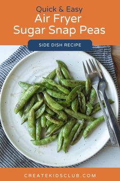 a white plate topped with sugar snap peas