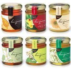 six jars of jams with labels on them are shown in different colors and designs