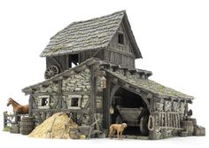 a small wooden building with a dog standing in front of it