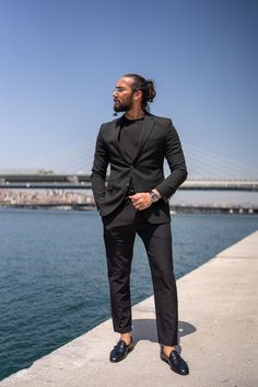 Experience the perfect blend of style and comfort with the HolloMen Utopia Black Blazer Jacket. This versatile blazer is ideal for layering over shirts and sweaters, adding a touch of dapper flair to any look.