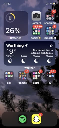 an image of the weather and clock displayed on a cell phone with trees in the background