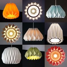 many different types of paper lamps hanging from the ceiling