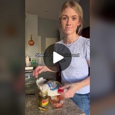 a woman standing in front of a kitchen counter with food on it and the words sheet cake behind her