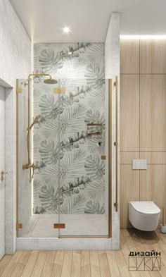 a bathroom with a glass shower door and wooden flooring next to a white toilet