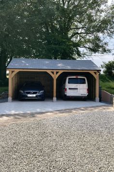 two cars are parked in the garage next to each other and there is a carport