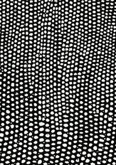 a black and white background with small dots