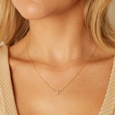 The 14K Gold Pave Cross Necklace comes in 3 sizes and is handset with approximately 0.05-0.12ct of diamonds. Hangs on a dainty chain and is perfect for layering or wearing on its own every day. 

Approx. 0.05-0.12ct
High  Quality G-H Color VS2-SI1 Clarity Natural Diamond

Solid 14K Gold
Lifetime Guarantee
Made in Los Angeles Dainty Cross Necklace Gold, Simple Cross Necklace, Cross Necklace Simple, Cross Necklace Gold, Diamond Cross Necklace Gold, Dainty Cross Necklace, Gold Cross Necklace, Dainty Chain, Diamond Cross